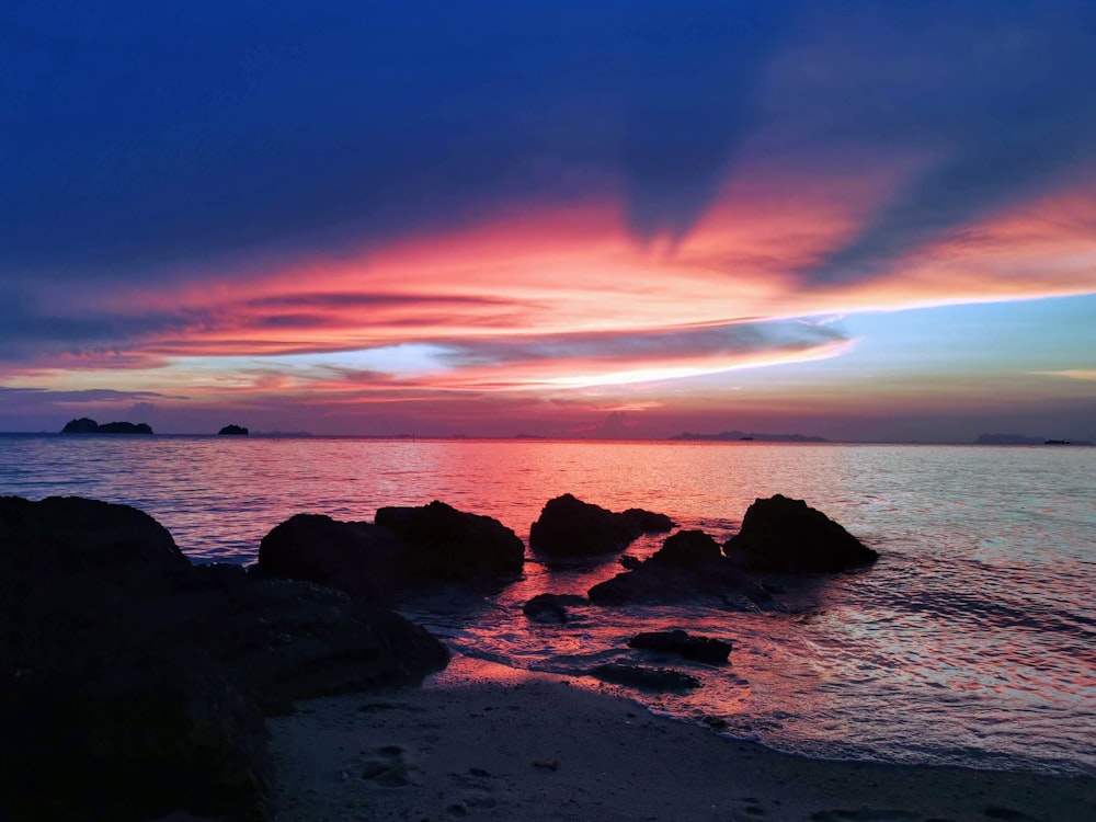 body of water and sunset