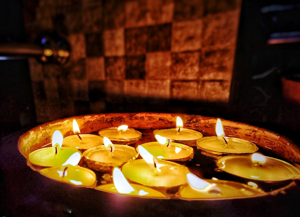 tealight on gray concrete tray