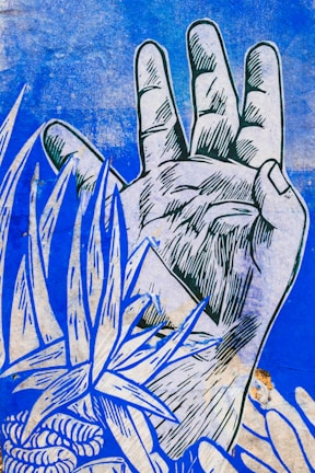 A stylized, graphic depiction of a hand with intricate line work. Surrounding the hand are abstract, organic shapes resembling leaves and a flower, all set against a textured blue background.