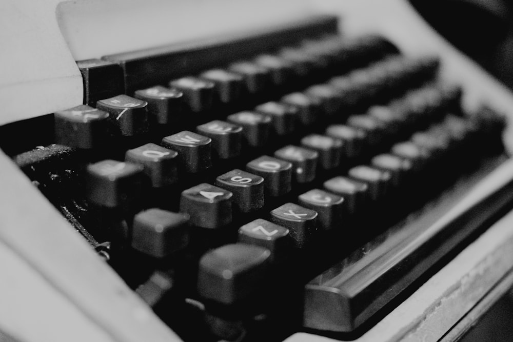 grayscale photo of electric typewriter