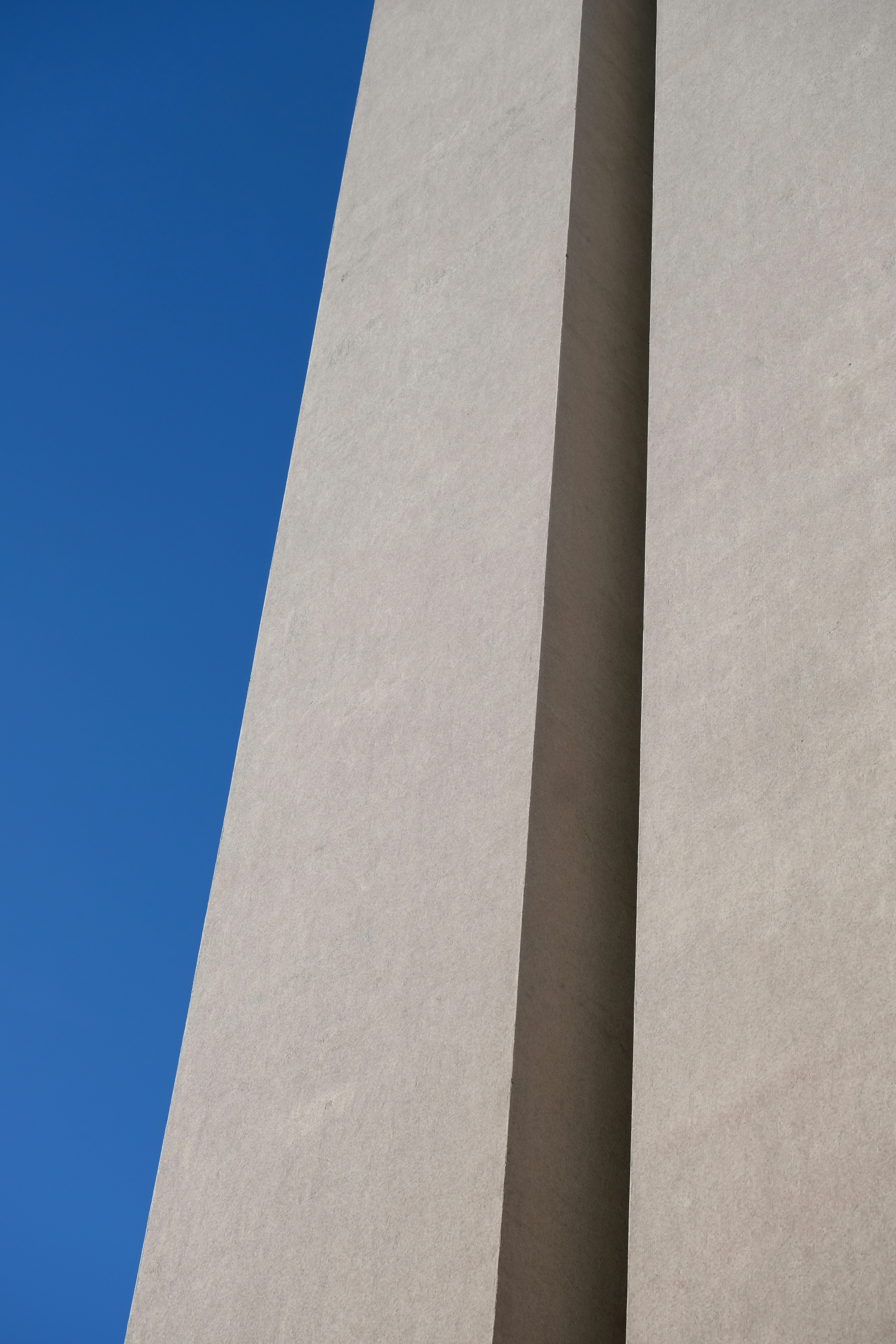 This is a beautiful architectural gem in Milan. Different angles show different vibes. Inspired by the ancient Egypt, I picked the perspective that captures the building's monolithic face.