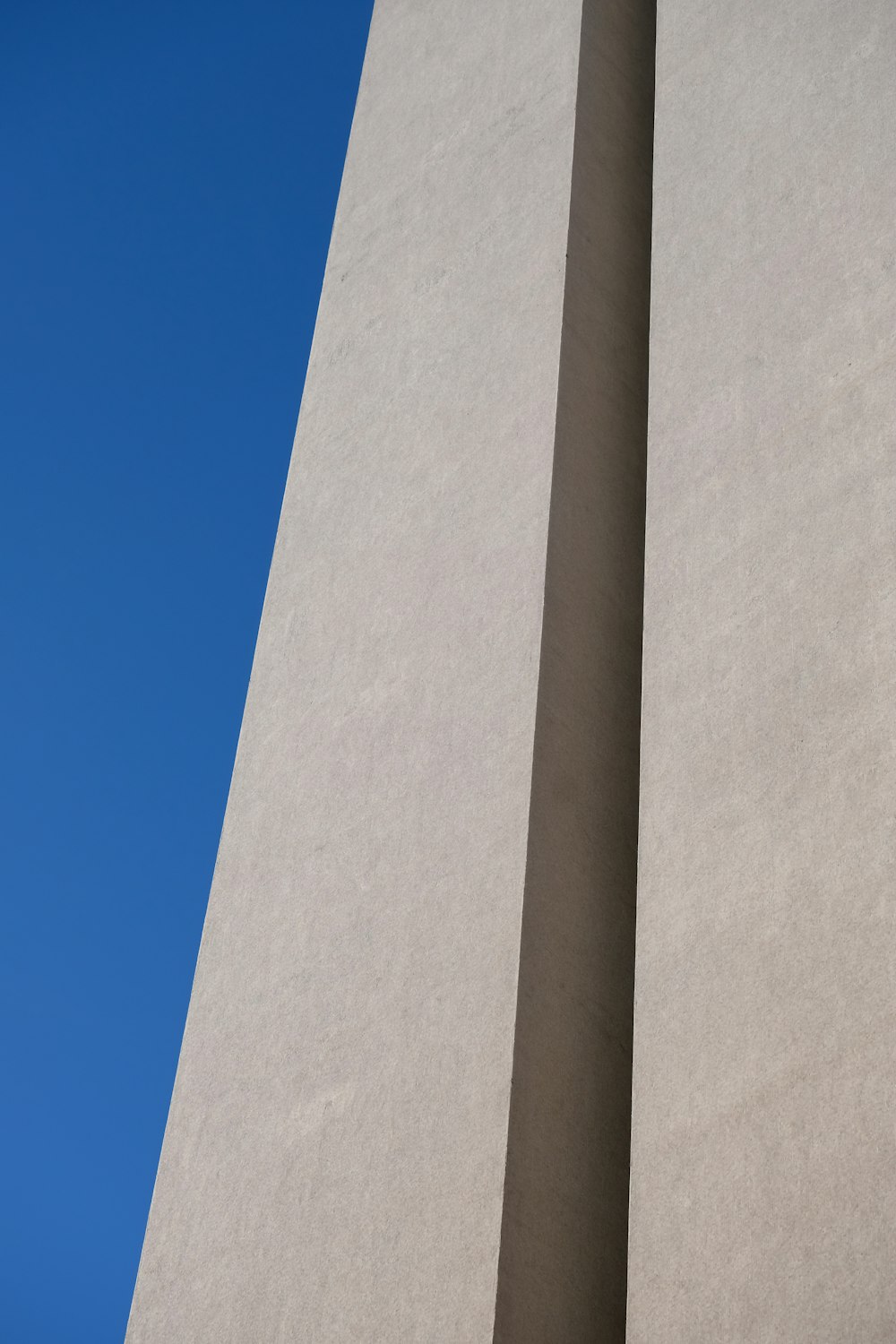 a tall building with a clock on the side of it