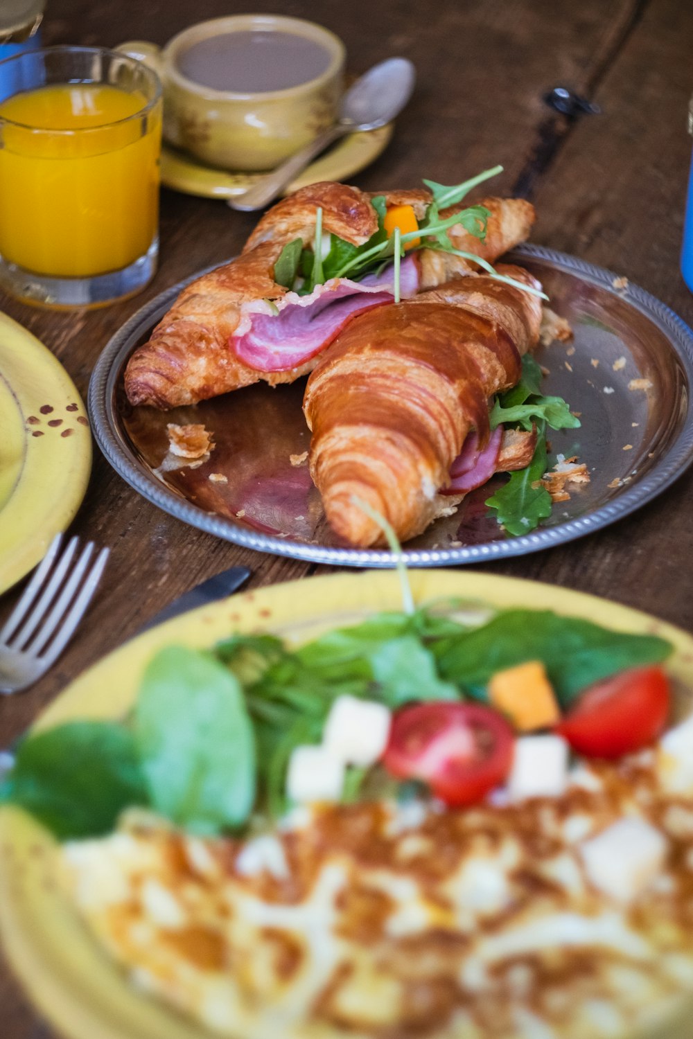 baked croissants on a gray plate