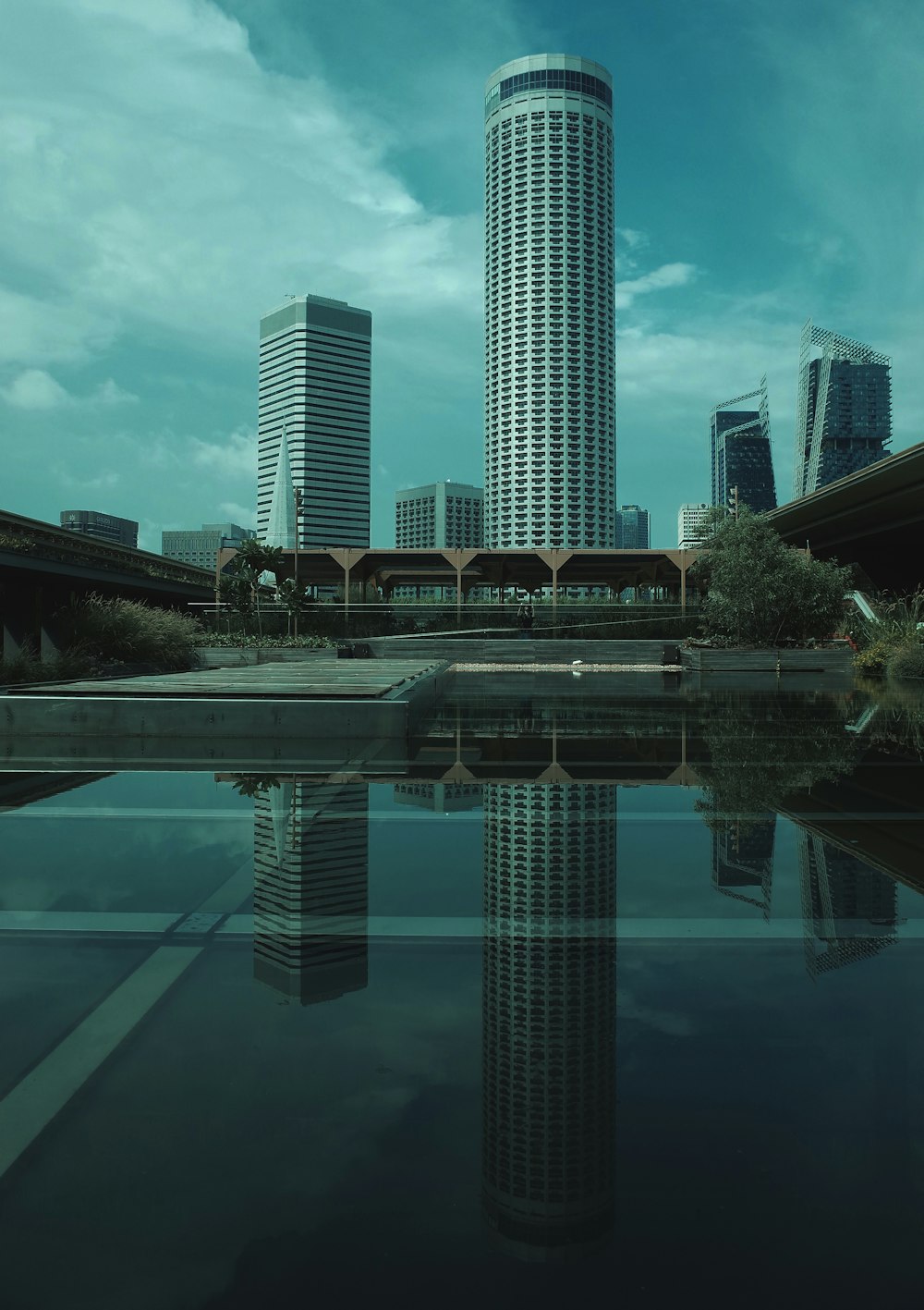 reflection of high rise buildings on mirror floor