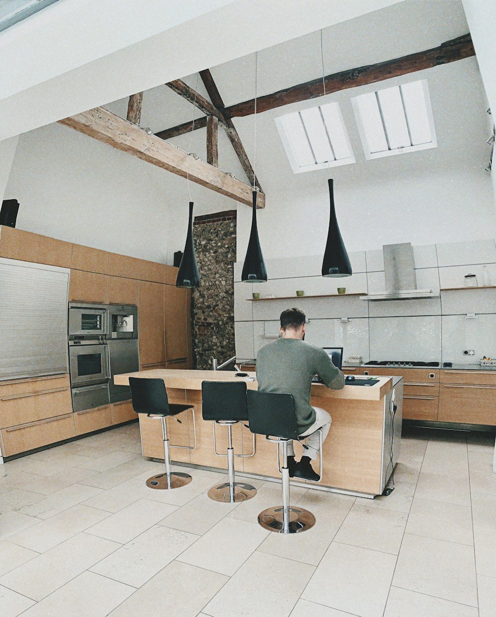 man sitting on chairs