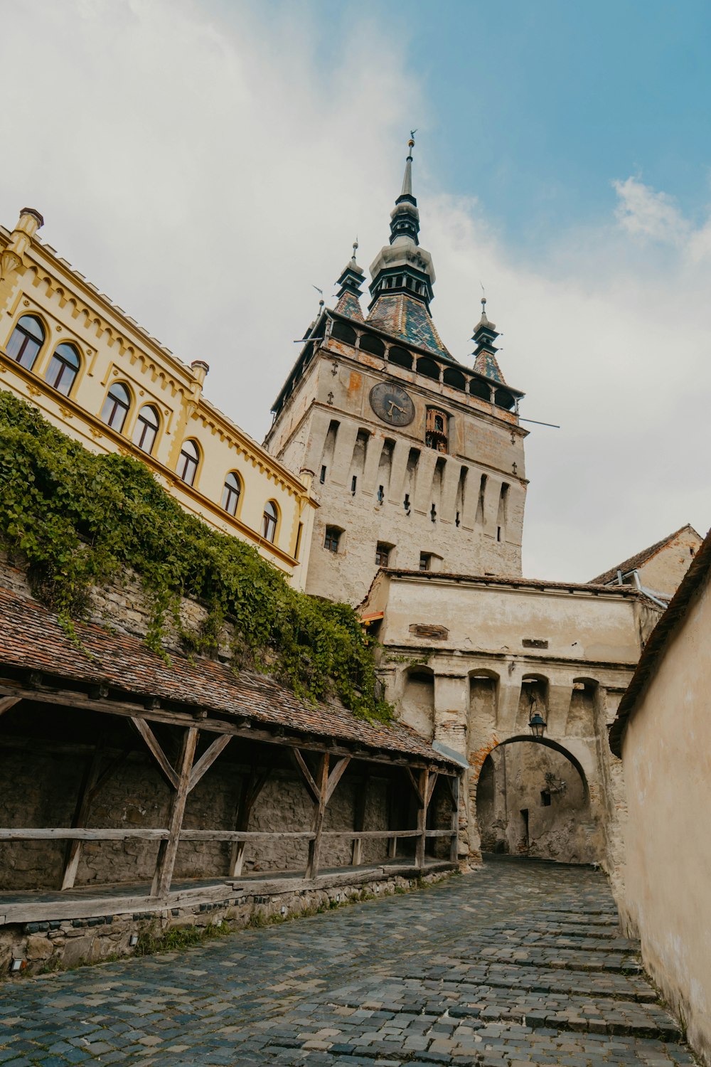 Sighisoara Clock Tower under cloudy sky