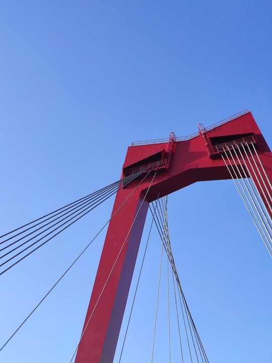 red cable stayed bridge post in Willemsbrug Netherlands
