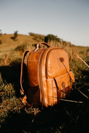 brown leather backpack