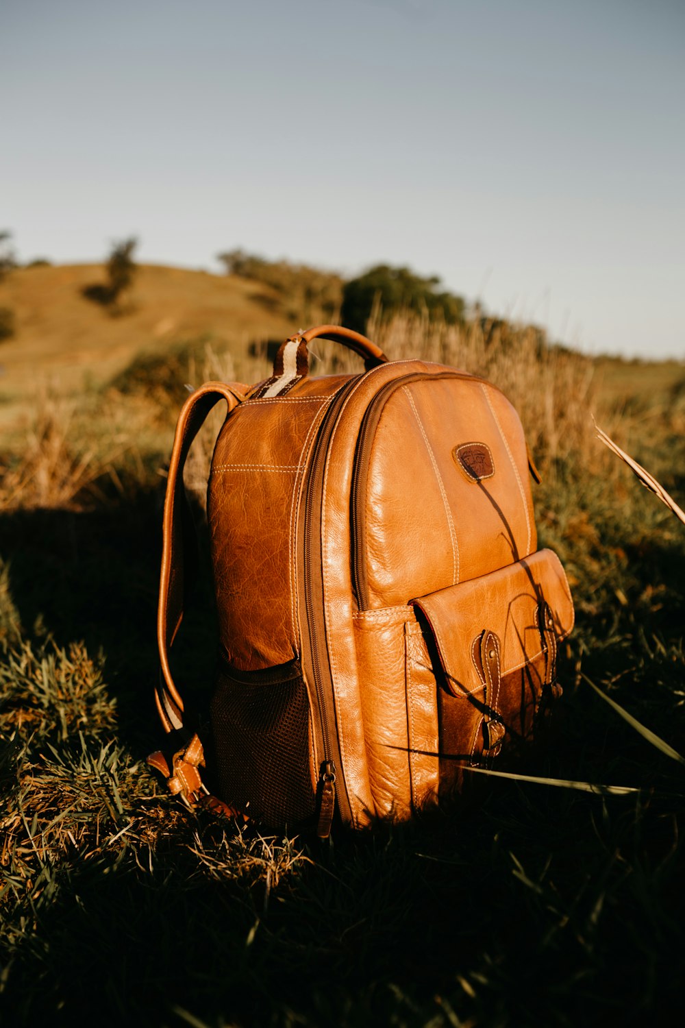 brown leather backpack