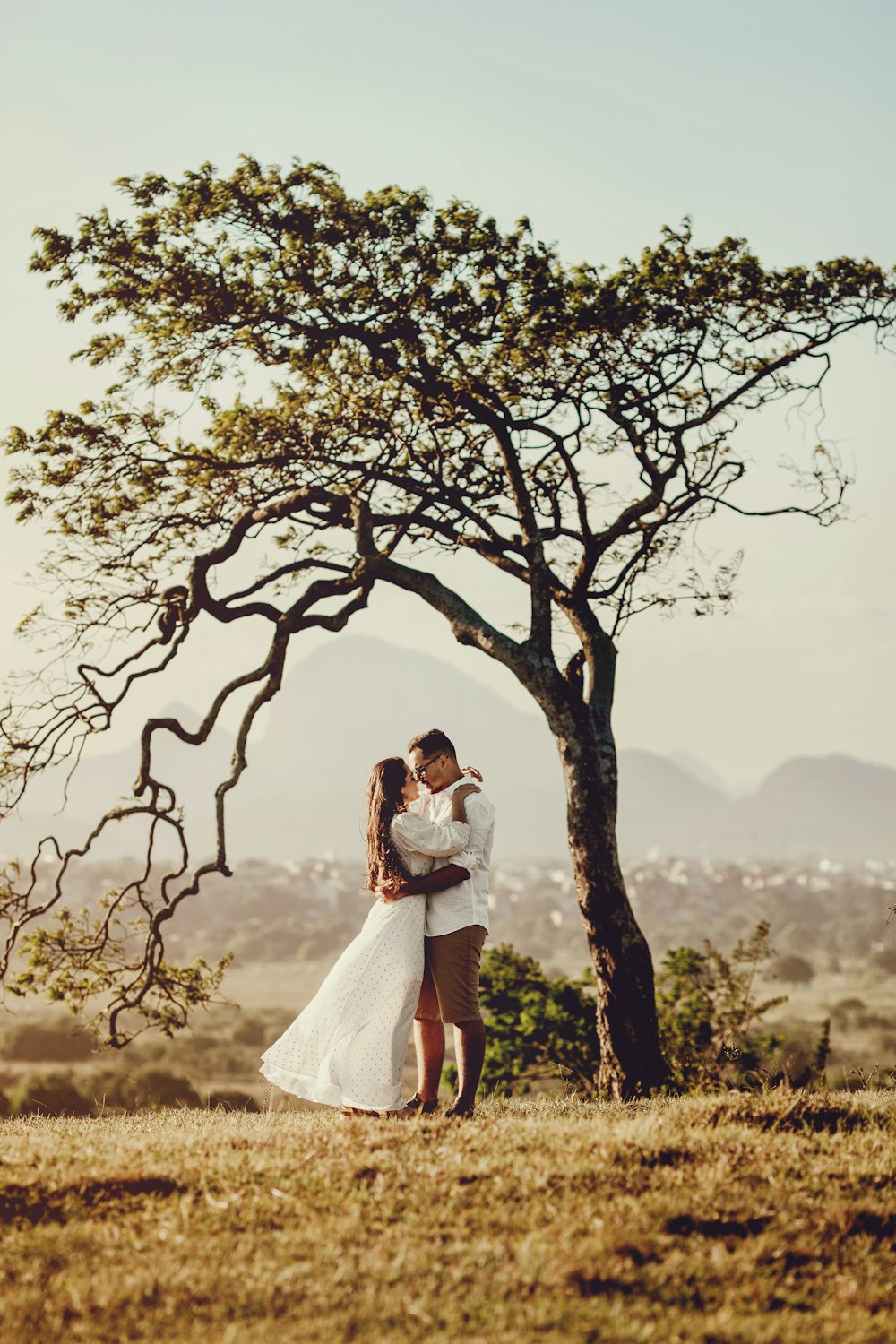 man and woman kissing