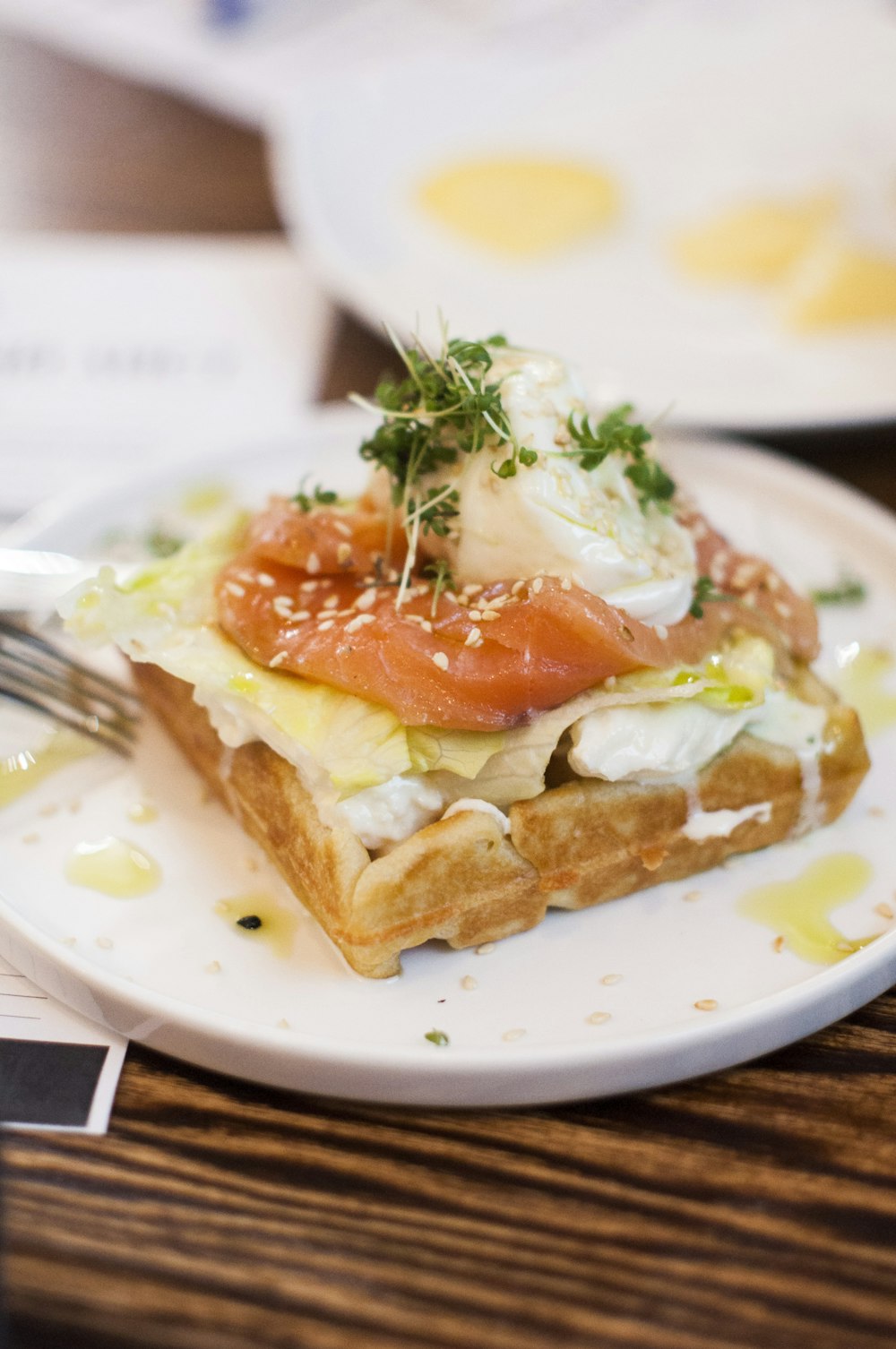 bread with fish and parsley on top