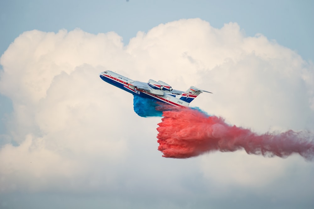 white, red, and blue plane photograph