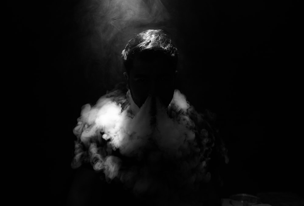 man smoking photograph