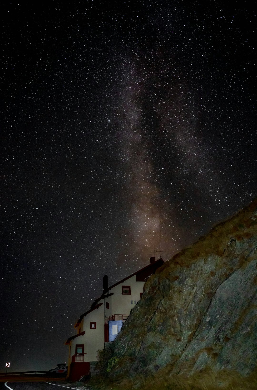 white 3-storey building under galaxy