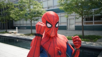 Spider-Man near white building