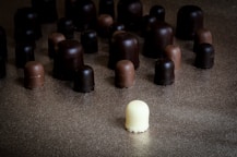 milk chocolate in front of scattered chocolates