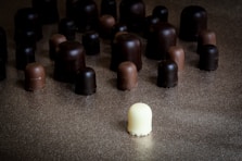 milk chocolate in front of scattered chocolates