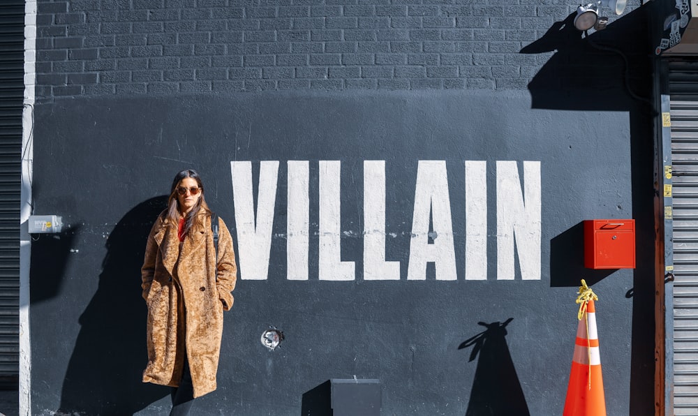 woman standing near wall