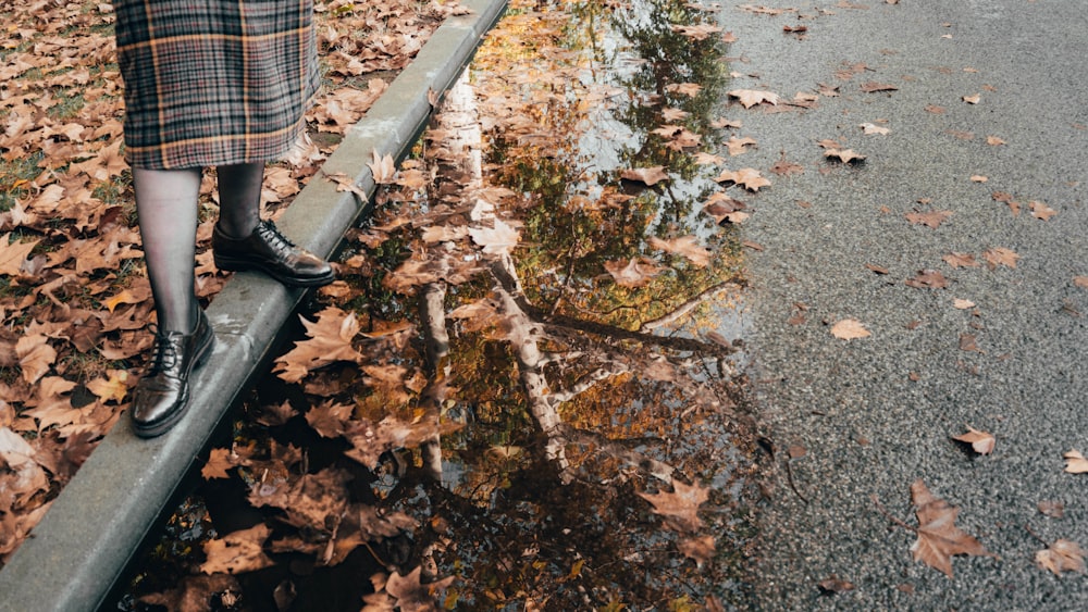 person standing on the curb