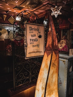 A cozy tea house interior with warm lighting and rustic decor.