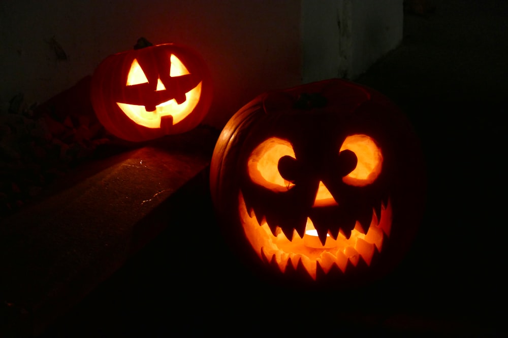 two lighted Jack o lantern decors