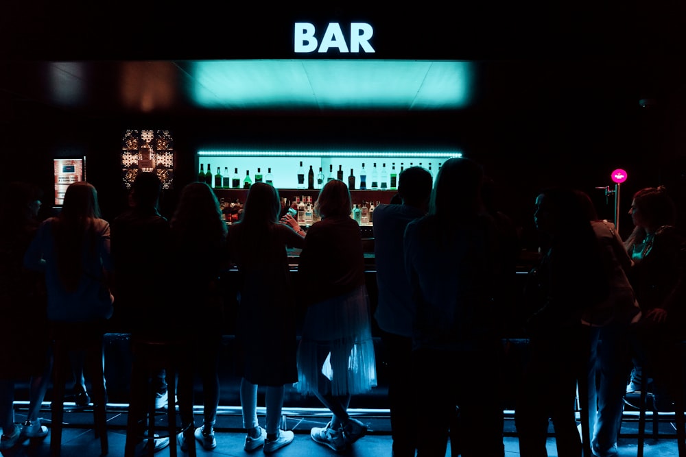 people standing on BAR table