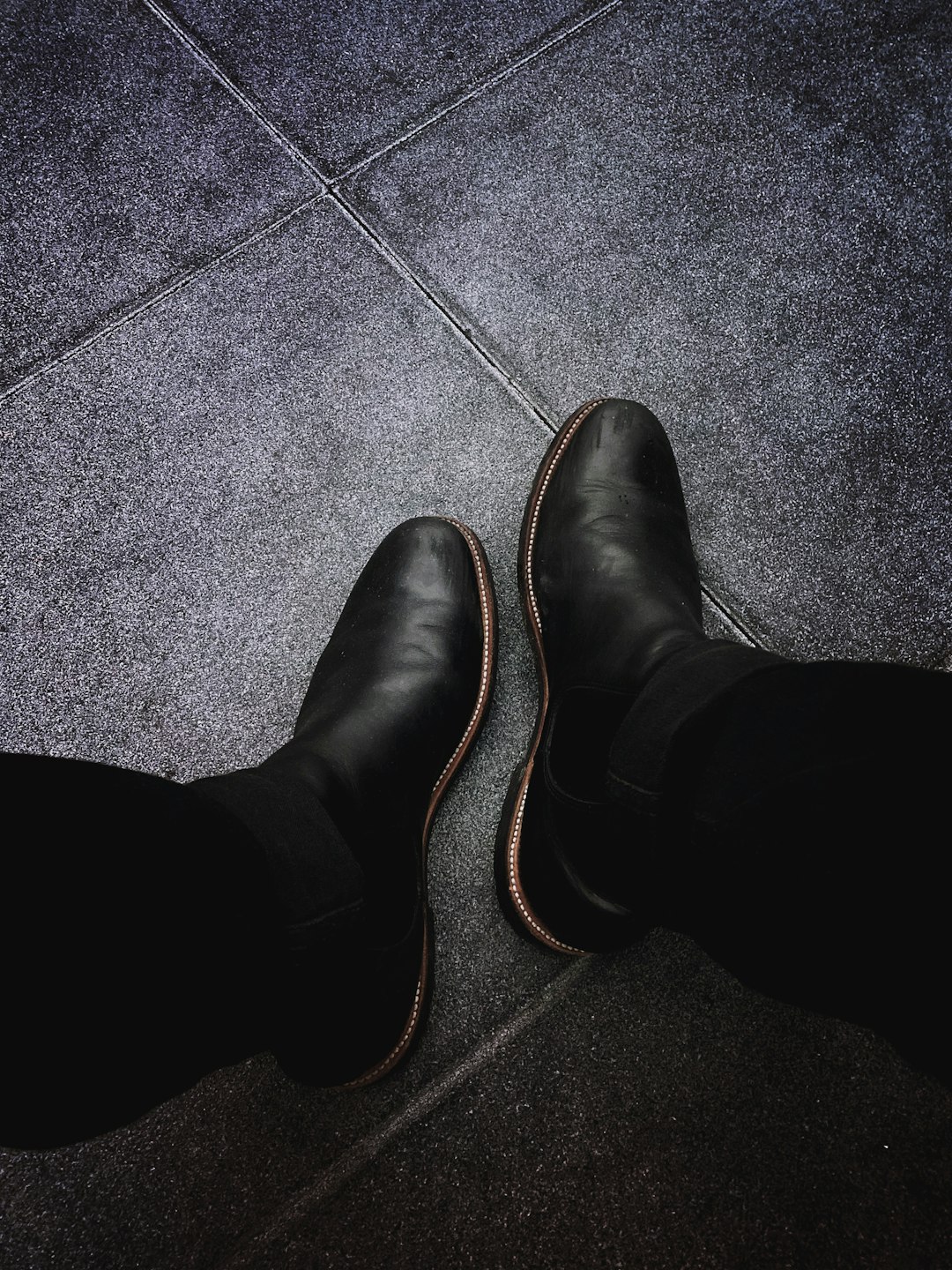 man wears black dress shoes