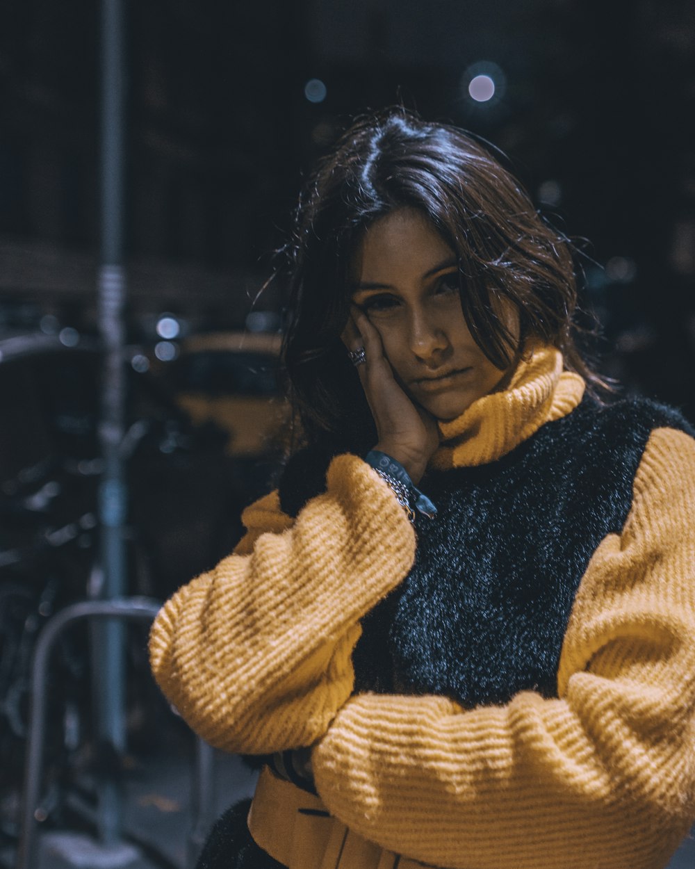 woman wearing orange and black top