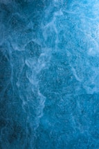 a close up of a blue water surface