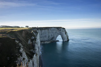 aerial photography of cliff near ocean