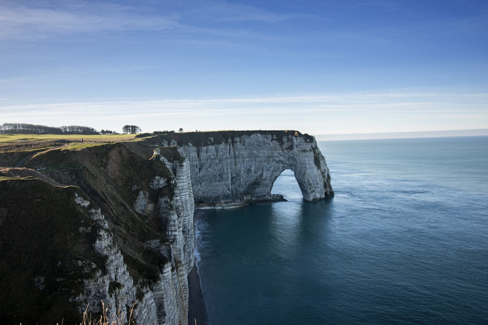 aerial photography of cliff near ocean