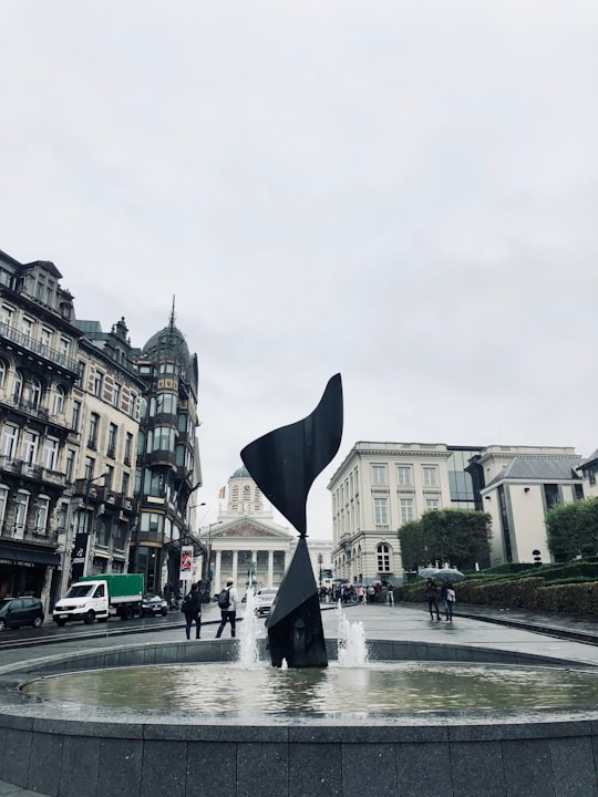 outdoor fountain under white sky in Mont des Arts Belgium