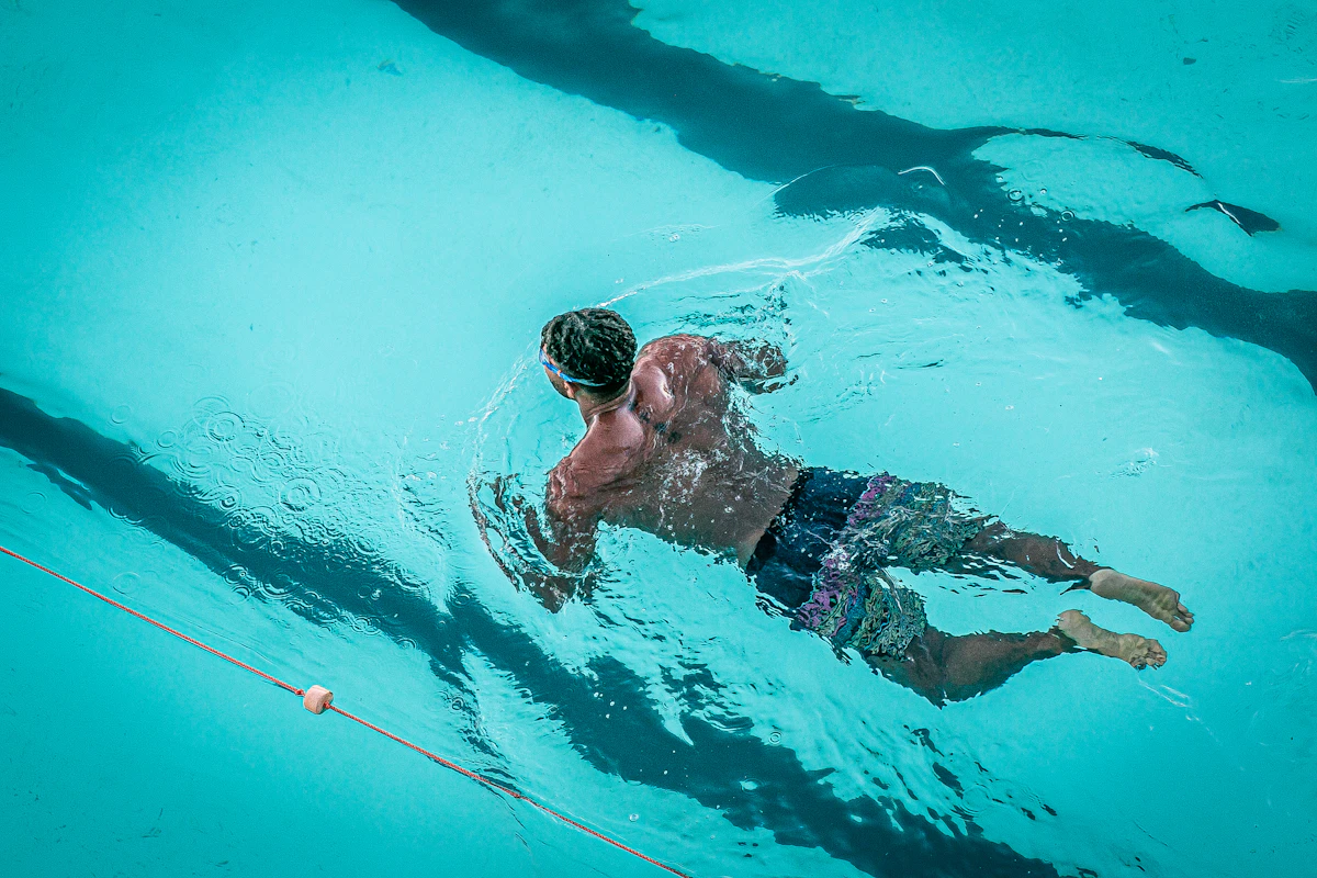 Person swimming in pool