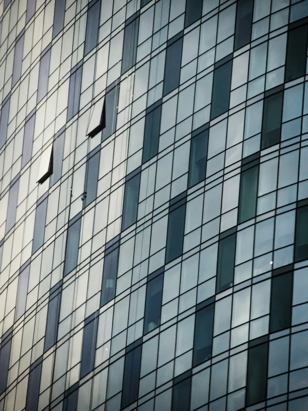 gray and black metal and glass building