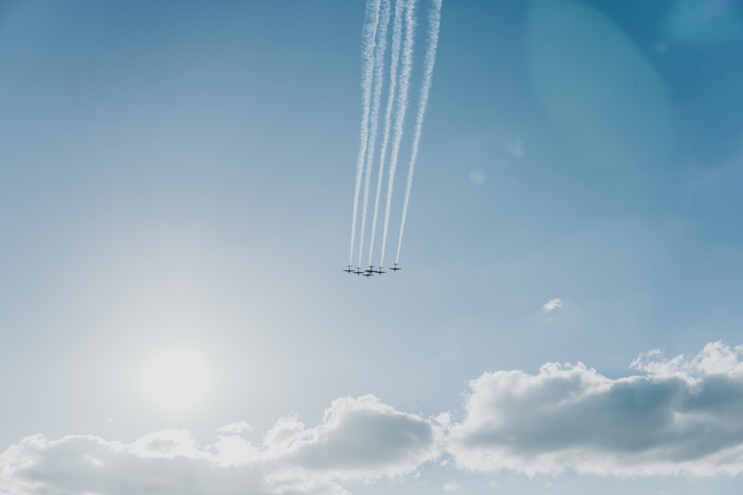 five planes flying during daytime