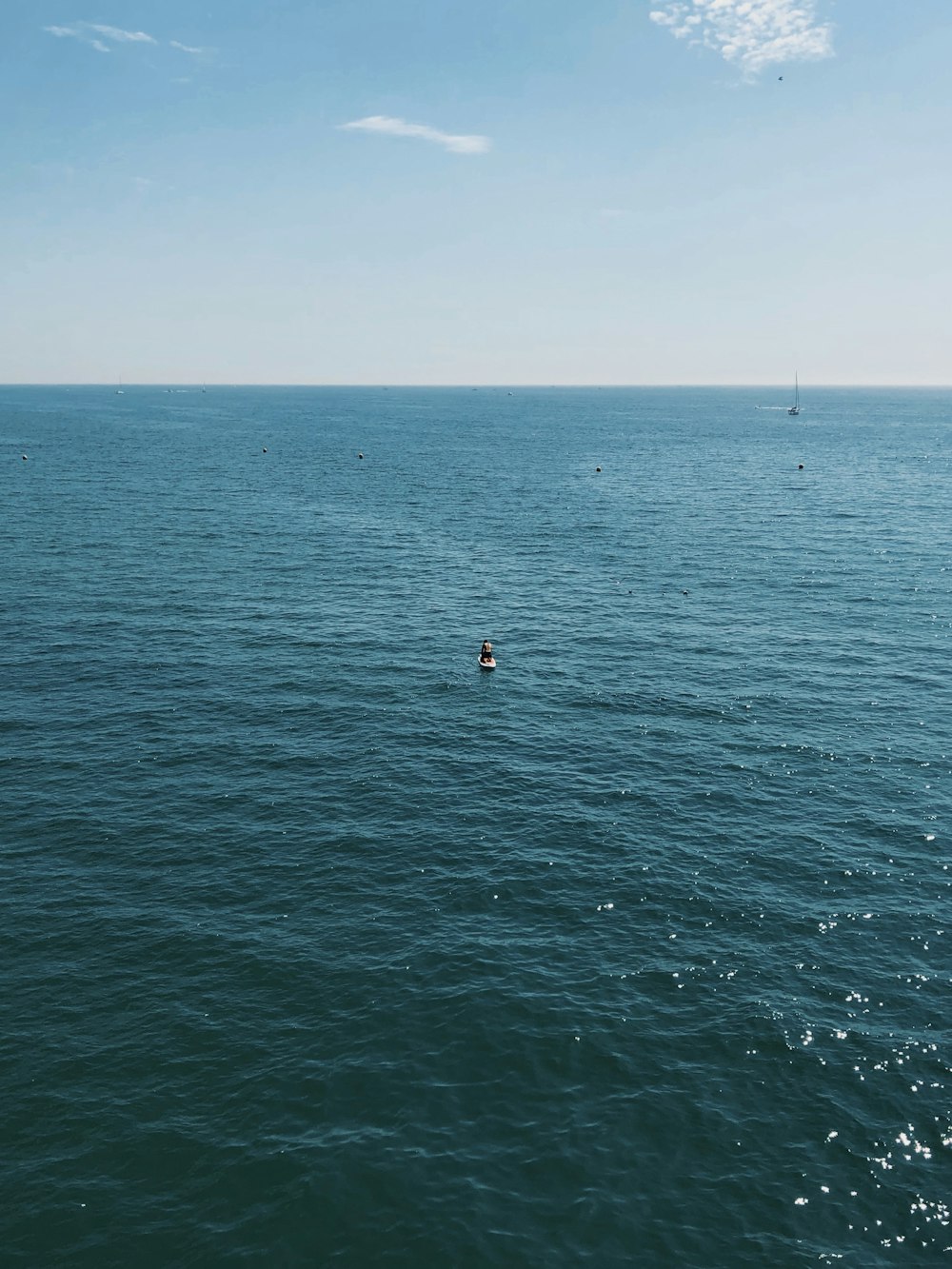 white boat and body of water