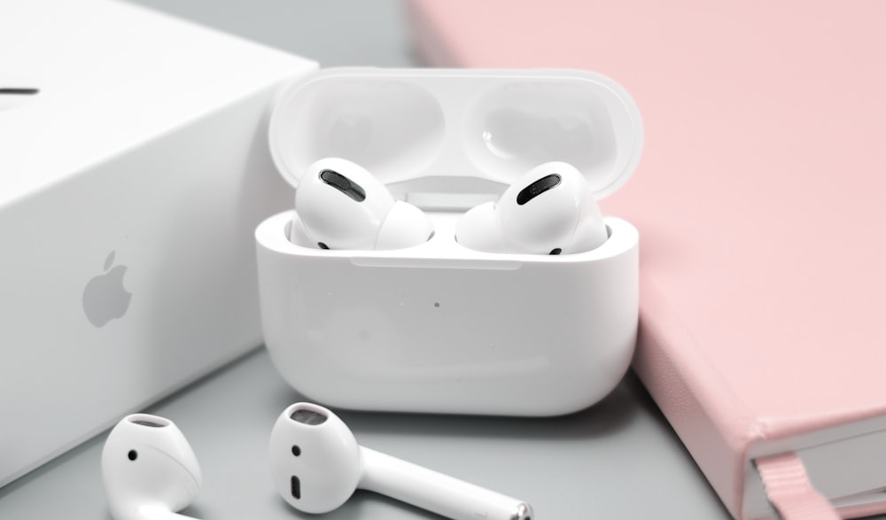 shallow focus photo of Apple AirPods