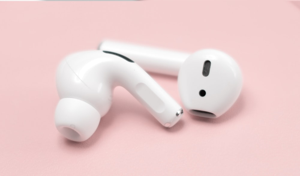 white wireless earbuds