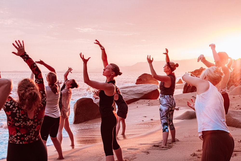 people standing near ocean