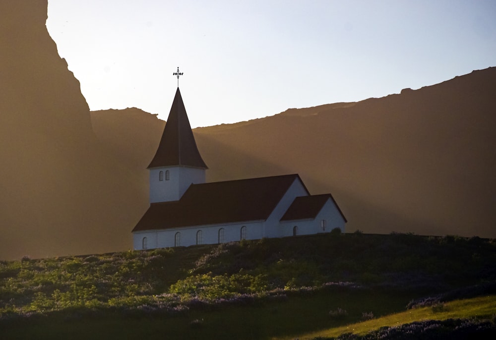 white and brown chapel during golden hour