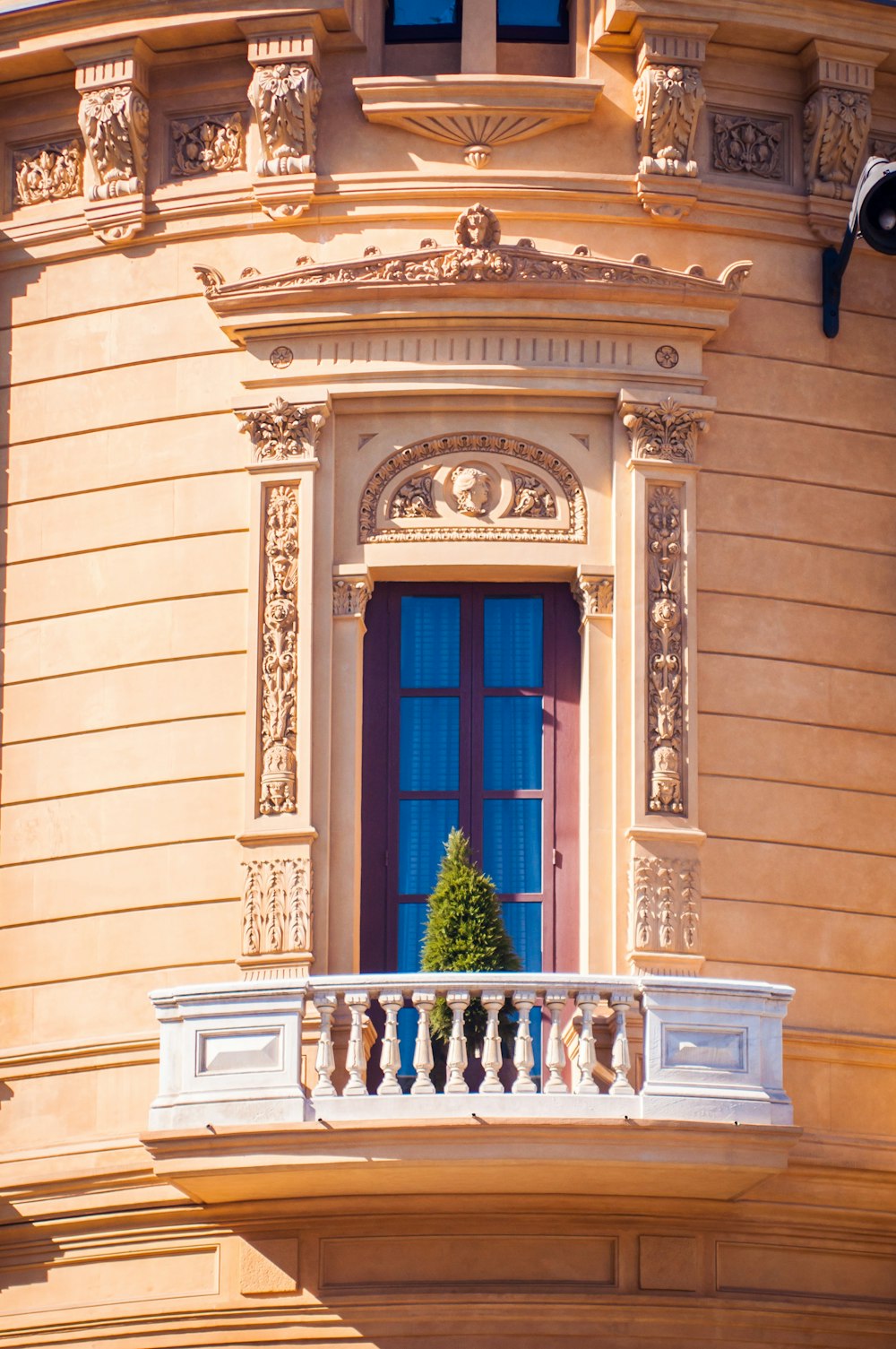 orange building viewing balcony during daytime