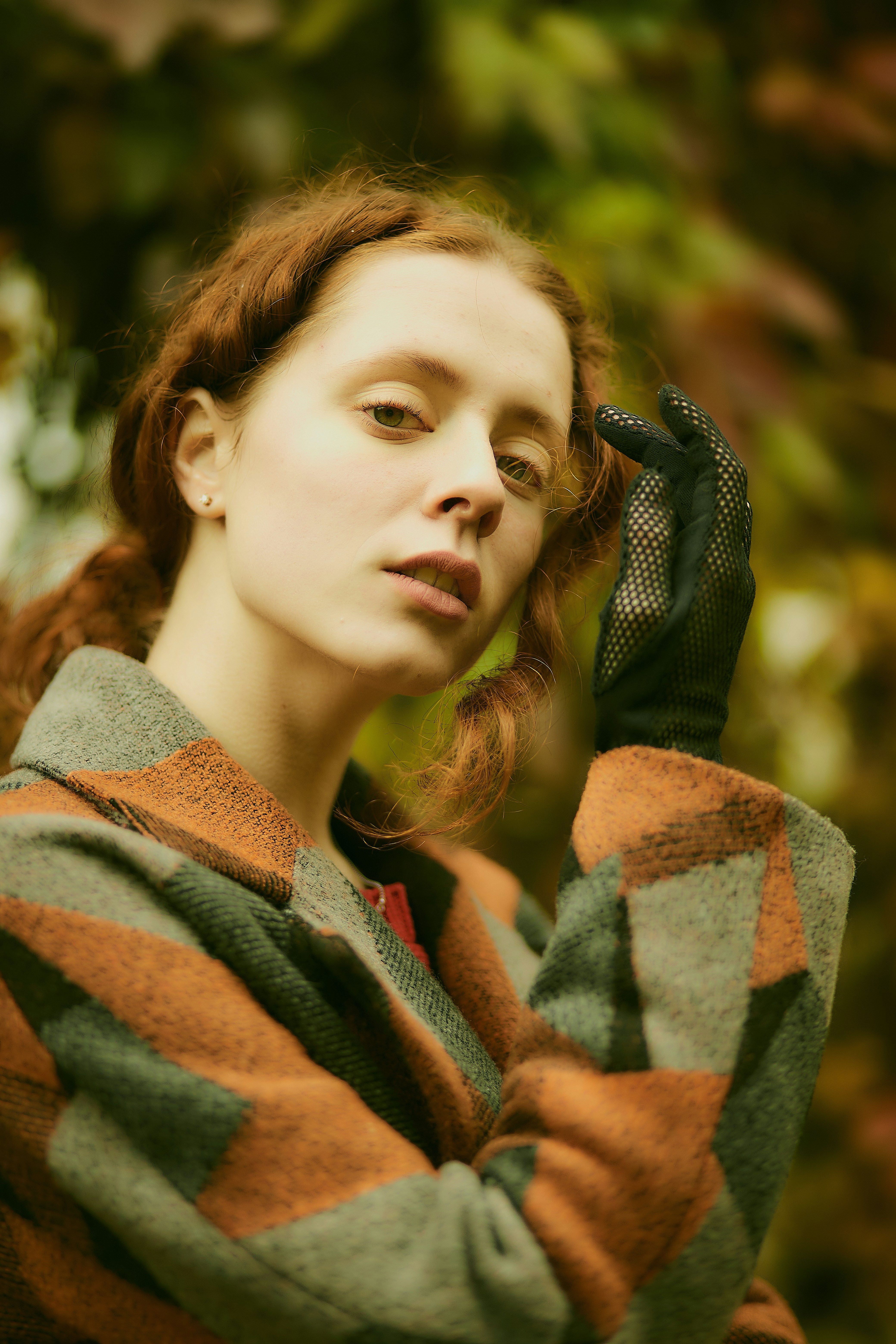 woman wearing brown and gray coat