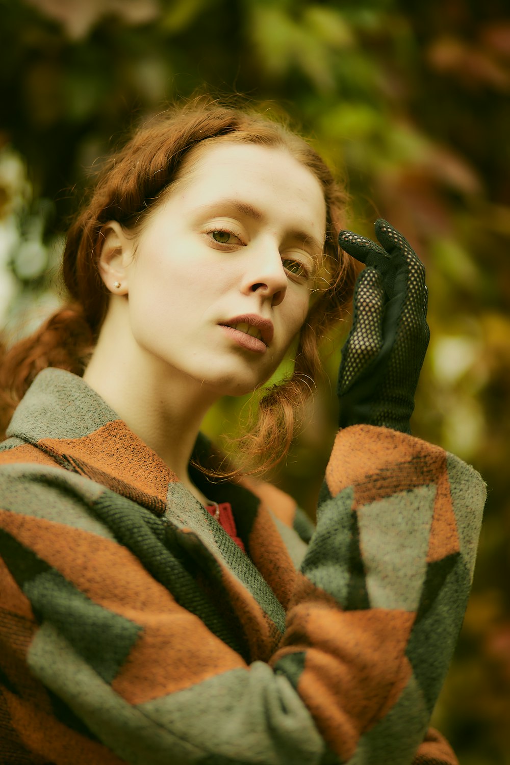 woman wearing brown and gray coat