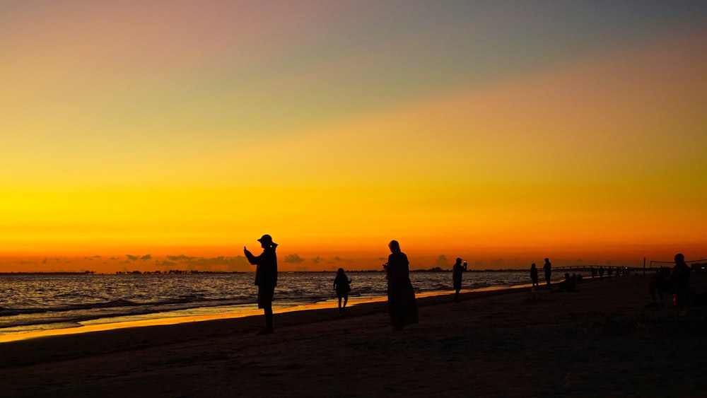 silhouette of a group at sunset