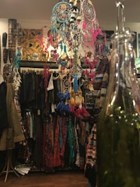 Mystical accessories like crystal pendants and dreamcatchers on display.