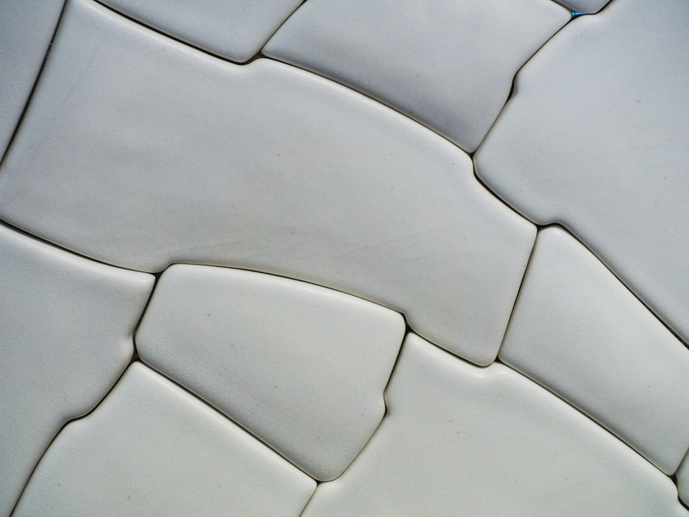 a close up view of a white ceramic object