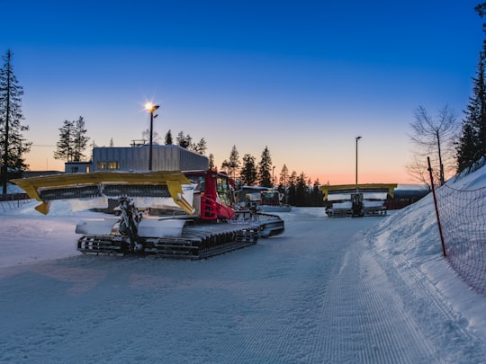 yellow and red tractor in Ruka Finland