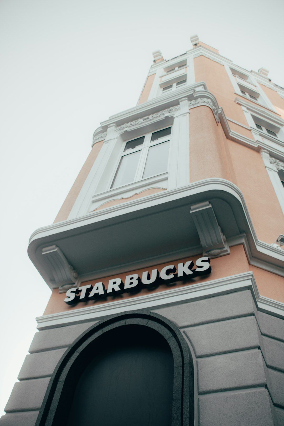 red and white Starbucks concrete tower
