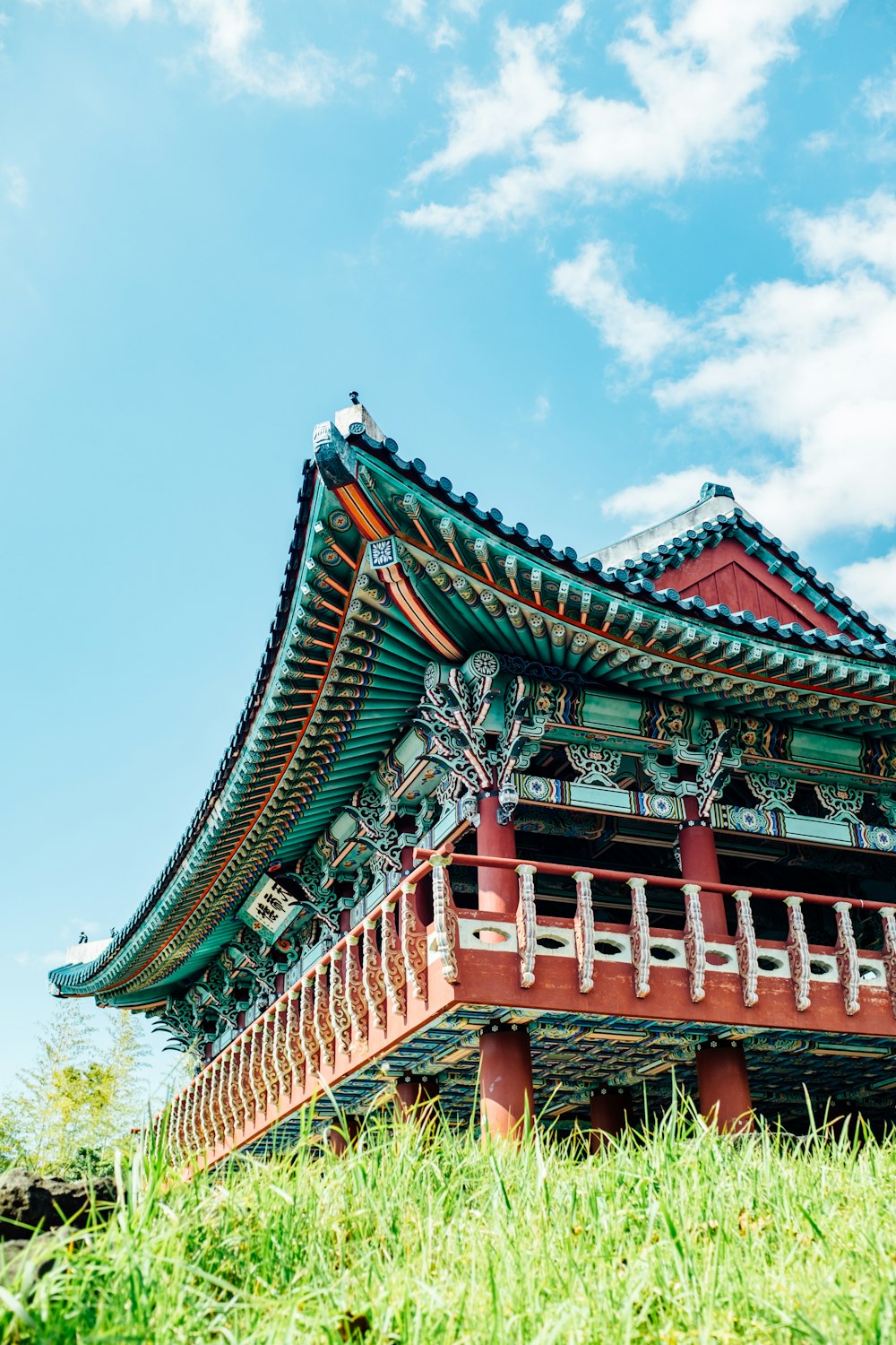 blue and maroon pagoda temple during daytime