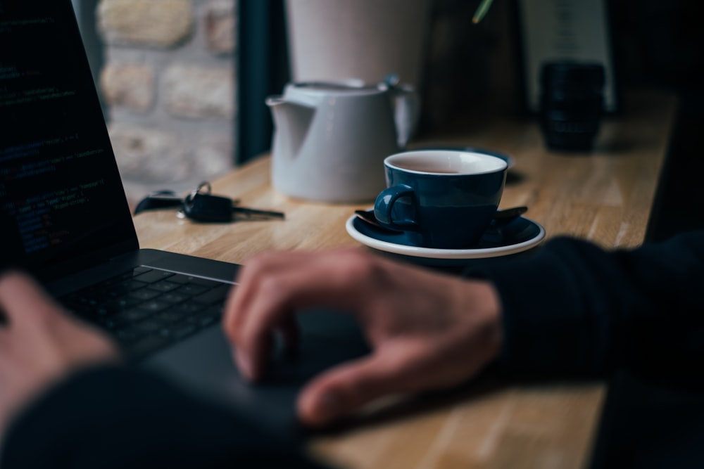 person using laptop computer